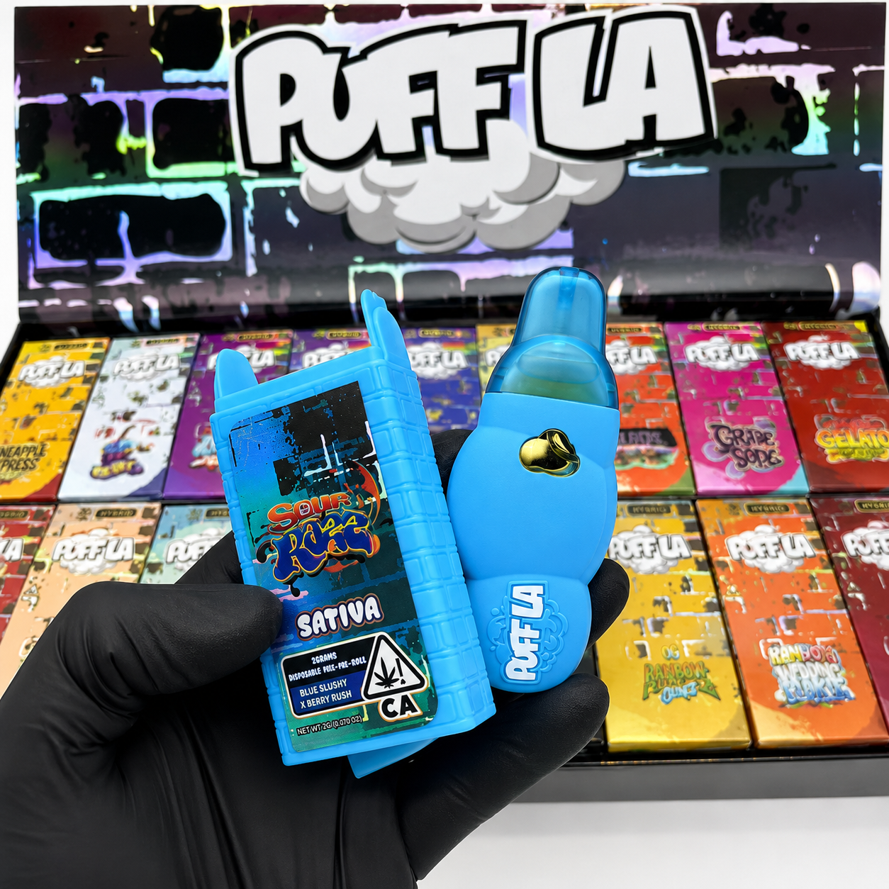 Puff LA Disposable 2G Liquid Diamonds vape with Sour Razz Blue Slushy x Berry Kush Sativa packaging.