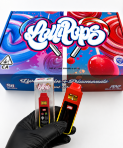 Lollipops Disposable 2G Dual Chamber Vape wholesale display box exterior showing blue and red lollipop artwork, Live Resin plus Diamonds label, Dual Flavors text, and California cannabis warning seal with NET WT 100 x 2GRAMS printed on bottom panel.